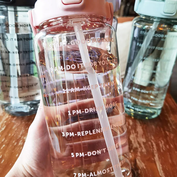 68 oz (2 Liters) Large Motivational Sports Water Bottle with Straw – Leak-Proof, Portable, and BPA-Free