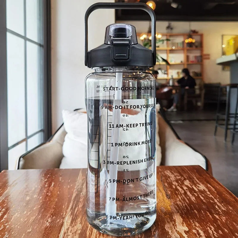 68 oz (2 Liters) Large Motivational Sports Water Bottle with Straw – Leak-Proof, Portable, and BPA-Free