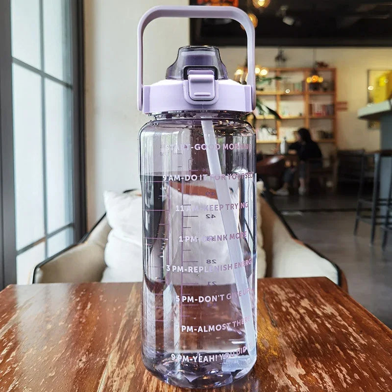 68 oz (2 Liters) Large Motivational Sports Water Bottle with Straw – Leak-Proof, Portable, and BPA-Free
