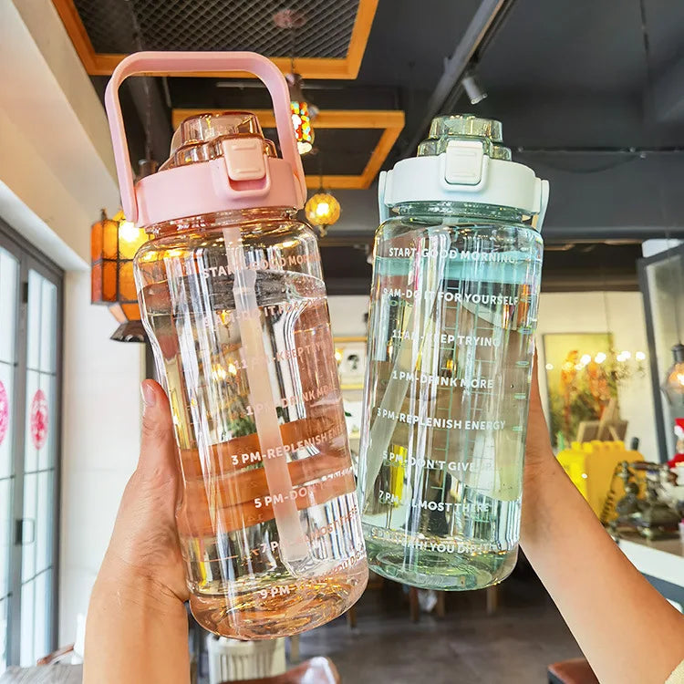68 oz (2 Liters) Large Motivational Sports Water Bottle with Straw – Leak-Proof, Portable, and BPA-Free