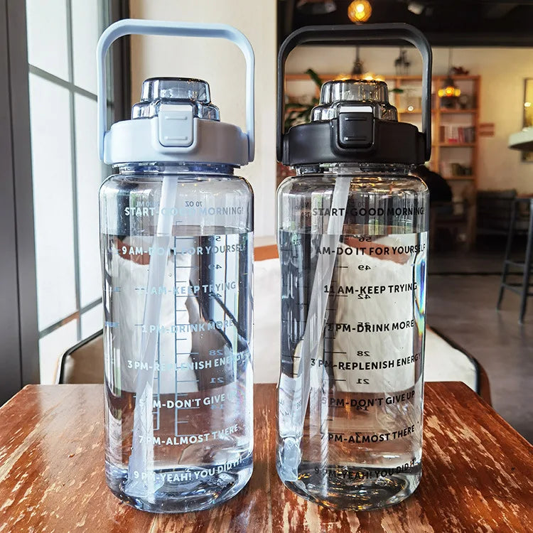 68 oz (2 Liters) Large Motivational Sports Water Bottle with Straw – Leak-Proof, Portable, and BPA-Free