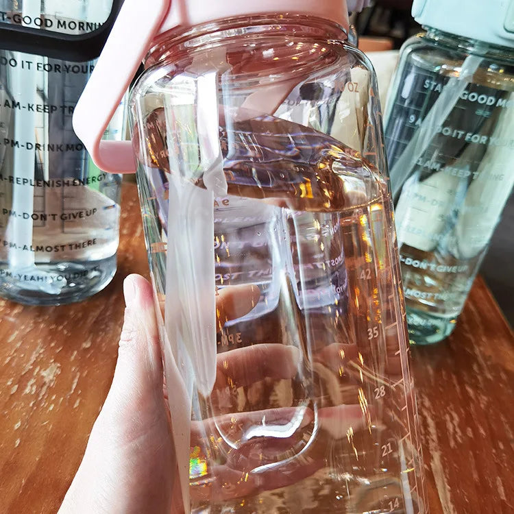 68 oz (2 Liters) Large Motivational Sports Water Bottle with Straw – Leak-Proof, Portable, and BPA-Free